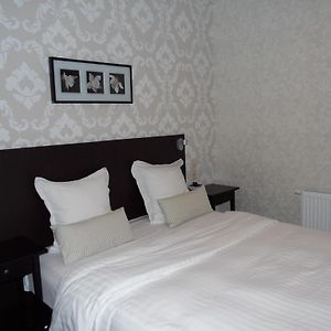 Kamer met een Queen Size Bed